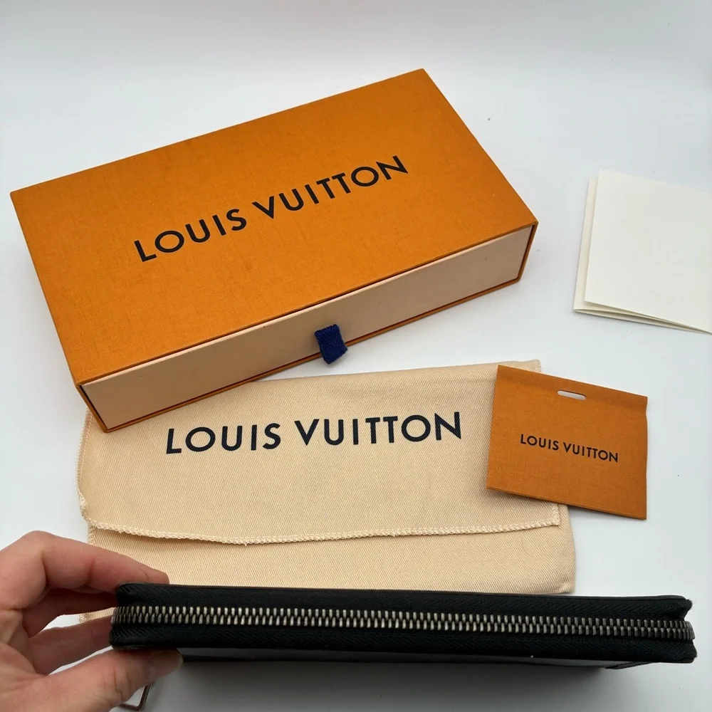 Louis Vuitton Black Monogram Eclipse zippy wallet with LV box and dust bag